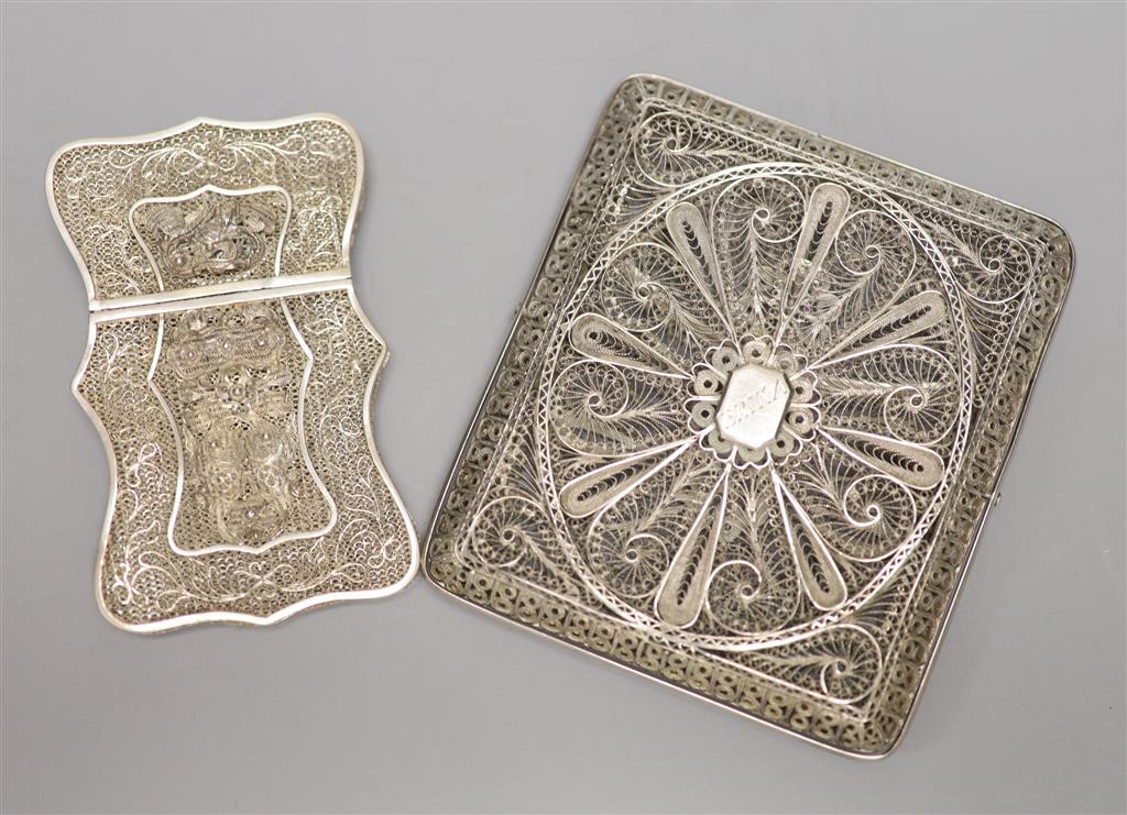 A Chinese filligree white metal card case, 84mm and a similar swivel action cigarette case, 97mm.